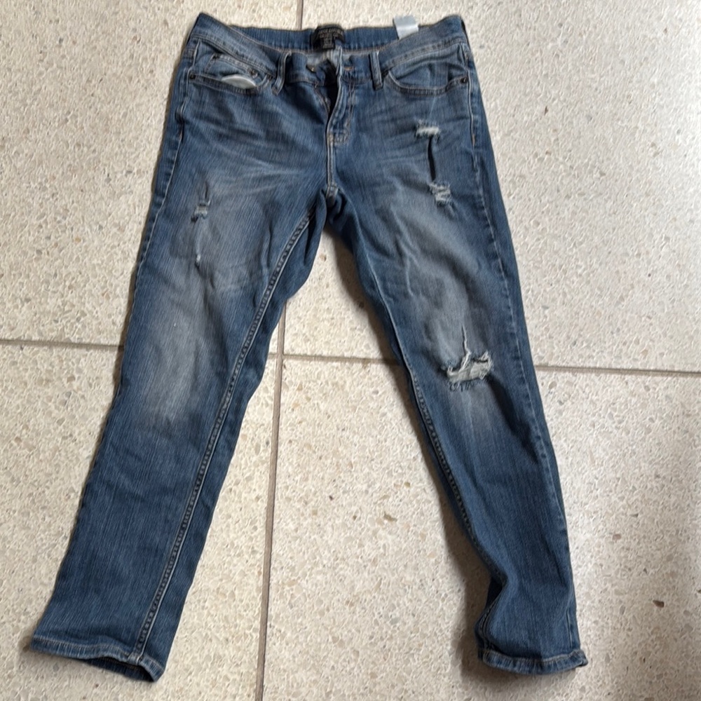 Distressed Blue Denim Jeans